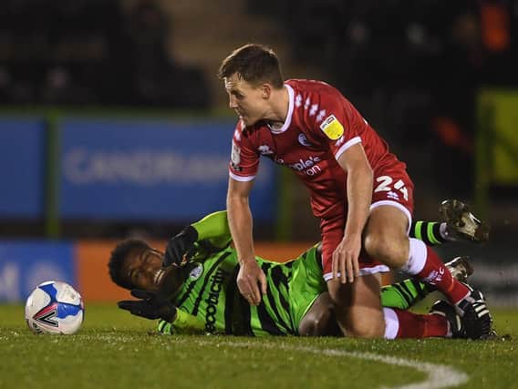 EXPERIENCED: Crawley Town's former Millwall defender Tony Craig, right, challenging Jayden Richardson of Forest Green Rovers last month. Photo by Harry Trump/Getty Images.
