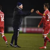 KEY MEN: Crawley Town boss John Yems, centre, with midfielder Jake Hessenthaler, right, and striker Tom Nichols, left, after the 2-1 victory at Forest Green Rovers in which Nichols hit a brace. Photo by Harry Trump/Getty Images.