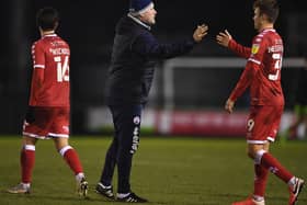 KEY MEN: Crawley Town boss John Yems, centre, with midfielder Jake Hessenthaler, right, and striker Tom Nichols, left, after the 2-1 victory at Forest Green Rovers in which Nichols hit a brace. Photo by Harry Trump/Getty Images.
