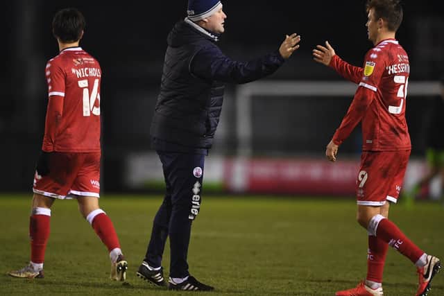 KEY MEN: Crawley Town boss John Yems, centre, with midfielder Jake Hessenthaler, right, and striker Tom Nichols, left, after the 2-1 victory at Forest Green Rovers in which Nichols hit a brace. Photo by Harry Trump/Getty Images.