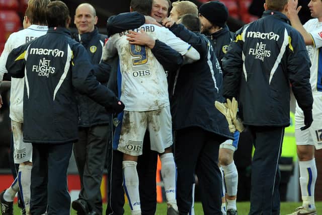 WE DID IT! Boss Simon Grayson hugs match-winner Jermaine Beckford after the 1-0 win against Manchester United at Old Trafford in the FA Cup third round of January 2010. Photo credit should read PAUL ELLIS/AFP via Getty Images.