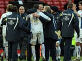 WE DID IT! Boss Simon Grayson hugs match-winner Jermaine Beckford after the 1-0 win against Manchester United at Old Trafford in the FA Cup third round of January 2010. Photo credit should read PAUL ELLIS/AFP via Getty Images.