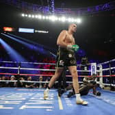 BACKING: For Crawley Town from Tyson Fury, pictured after knocking down Deontay Wilder in the fifth round during their heavyweight bout for Wilder's WBC and Fury's lineal heavyweight title in Las Vegas. Photo by Al Bello/Getty Images.