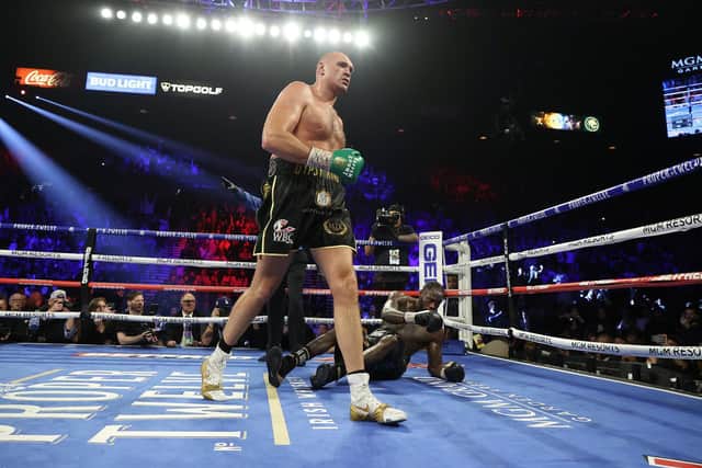 BACKING: For Crawley Town from Tyson Fury, pictured after knocking down Deontay Wilder in the fifth round during their heavyweight bout for Wilder's WBC and Fury's lineal heavyweight title in Las Vegas. Photo by Al Bello/Getty Images.