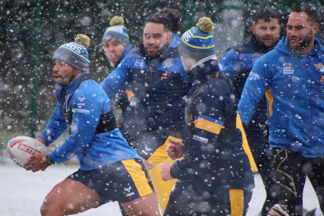 Rhinos trained in the snow on Friday, without injured captain Luke Gale. Picture by Phil Daly.