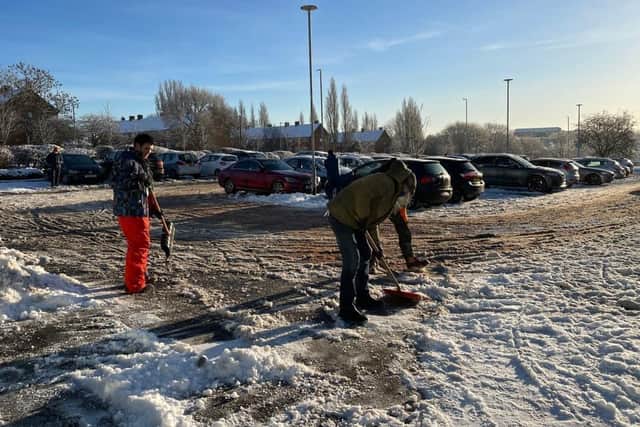It took volunteers just two hours to clear the snow and ice.