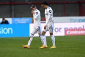 Leeds United's Gjanni Alioski and Helder Costa react at full-time following defeat to Crawley. Pic: Simon Hulme