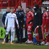 PRO DEBUT: Crawley Town boss John Yems, left, Leeds United's Gjanni Alioski, second left, and Whites head coach Marcelo Bielsa, right, look on as Crawley Town's Mark Wright comes off the bench. Photo by Mike Hewitt/Getty Images.