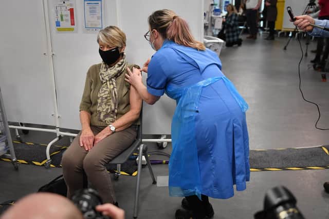 Rita Passey receives an injection of a Covid-19 vaccine at the NHS vaccine centre that has been set up at the Millennium Point centre in Birmingham. The centre is one of the seven mass vaccination centres now opened to the general public as the government continues to ramp up the vaccination programme against Covid-19. Photo OA