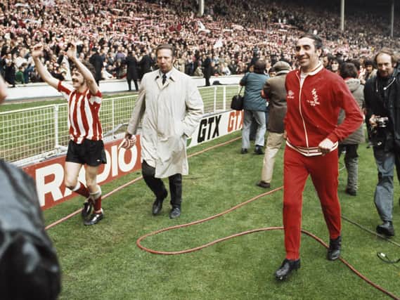 LEEDS' PAIN - Sunderland captain Bobby Kerr (l) and manager Bob Stokoe (red tracksuit) celebrate after their 1-0 victory over Leeds United in the 1973 FA Cup Final at Wembley Stadium. Pic: Getty