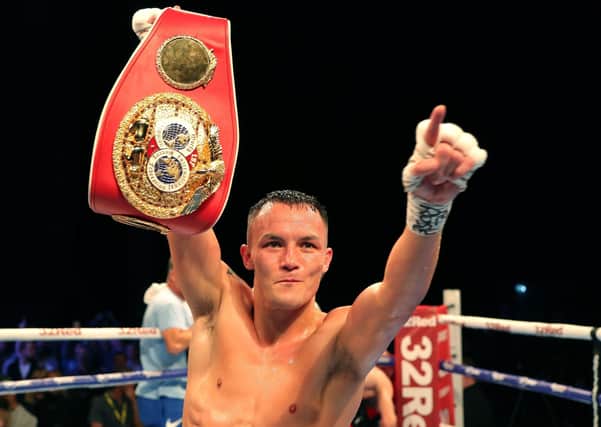 Josh Warrington celebrates defeating Sofiane Takoutch at First Direct Arena in October 2019. Picture: Richard Sellers/PA