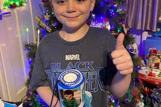 Thomas Hebbron with one of his charity boxes (photo: Gemma Hebbron).
