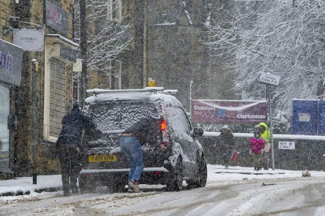 A driver got stuck in Farsley and had to be pushed (Photo: Tony Johnson)