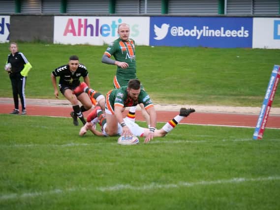 Hunslet's AJ Boardman pictured scoring against Bradford Bulls in pre-season last year. Both clubs are facing a delay to their 2021 campaign. Picture by Paul Johnson.