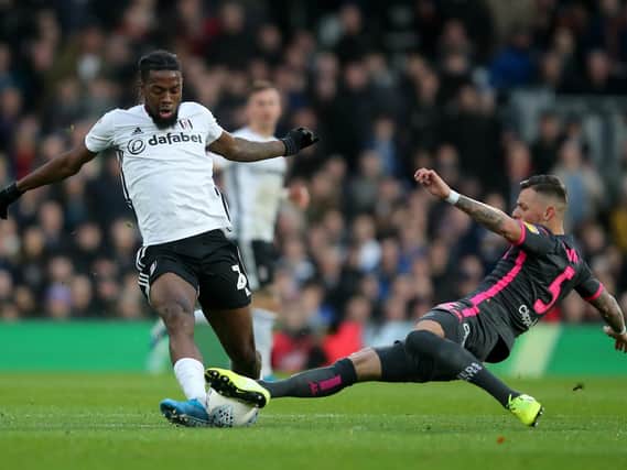 EVER-PRESENT: Former Leeds United loanee Ben White, right, pictured challenging Fulham's Josh Onomah during the Championship clash of December 2019. Photo by Marc Atkins/Getty Images.