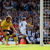 PERFECT START: Luke Murphy, right, races away after netting a stoppage time winner on his Leeds United debut to sink Brighton 2-1 at Elland Road back in August 2013. Photo by Michael Regan/Getty Images.