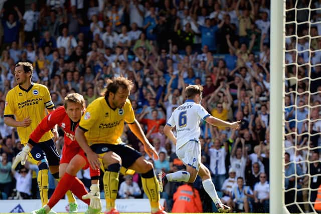 PERFECT START: Luke Murphy, right, races away after netting a stoppage time winner on his Leeds United debut to sink Brighton 2-1 at Elland Road back in August 2013. Photo by Michael Regan/Getty Images.
