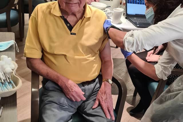 Resident Brian Green receives his first Covid-19 jab at Windsor Court, Wetherby.