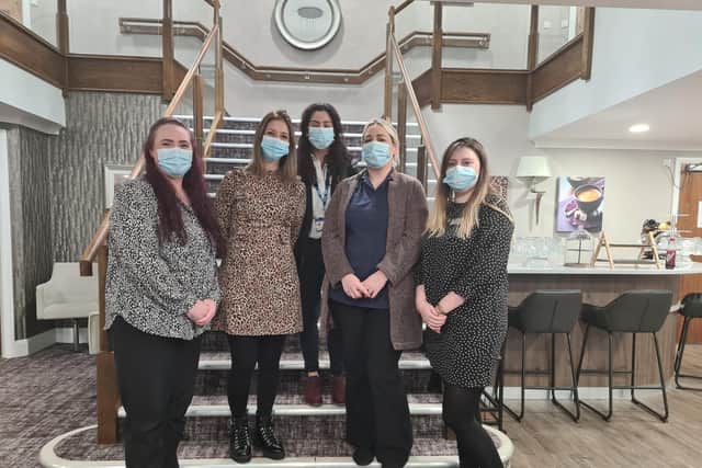 Home manager Paula Mountjoy, left, and staff member Sophie Summerscales, right, with the vaccination team from Westgate Surgery in Otley.