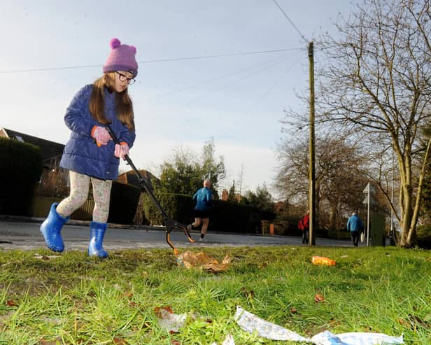 Evie Koleszko Turner out litter picking in Woodlesford.

Photo: Steve Riding