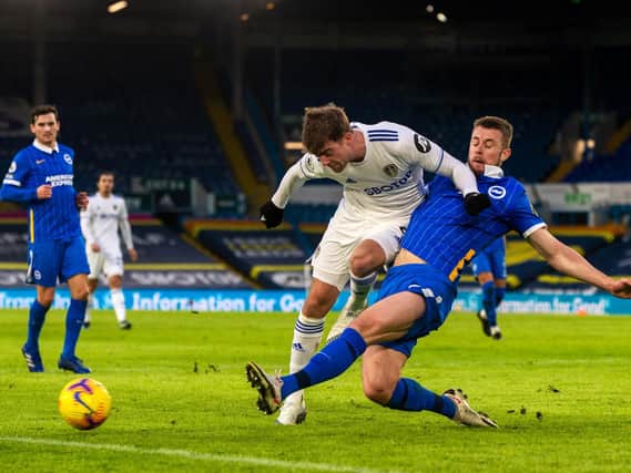 PITCH IMPERFECT - The Elland Road playing surface is long overdue a reconstruction and made heavy going of Leeds United's clash with Brighton today. Pic: Bruce Rollinson