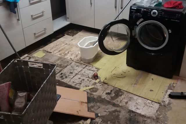 Farrah Marie Smith, 26, was forced to rip up her modern kitchen after discovering flooded waste under the floor from the leak.