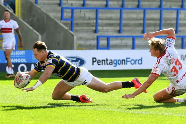 James Donaldson scores against his former club Hull KR last September. Picture by Jonathan Gawthorpe.