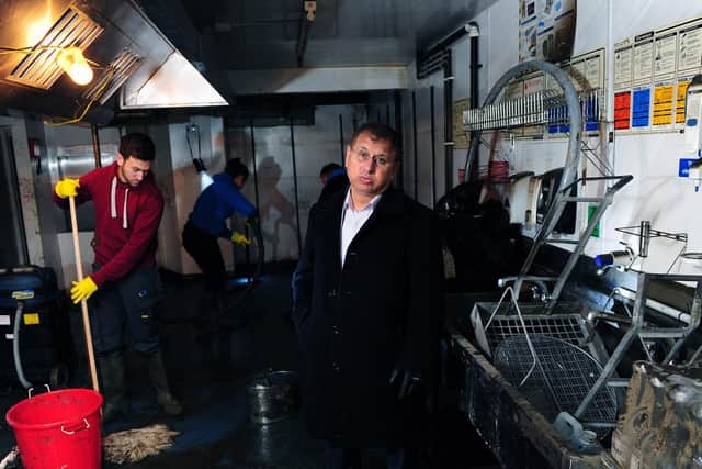 Azram Chaudhry pictured in the flood damaged cellar kitchens of  Sheesh Mahal restaurant on Kirkstall Road after the 2015 Boxing Day floods.

Picture Jonathan Gawthorpe