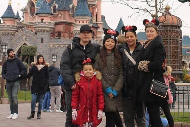 Vicki Aldwin (right)  with family on a trip to Disneyland Paris, one of her bucket list wishes.
