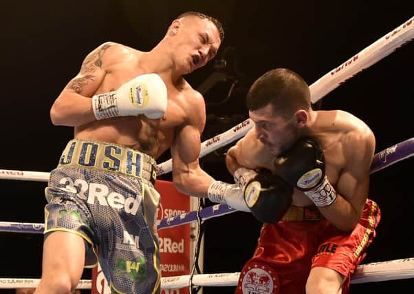 Josh Warrington out-punching Sofiane Takoucht at Leeds Arena in October 2019. Picture: Steve Riding.