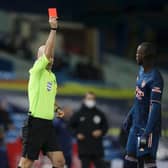 OFF: Referee Anthony Taylor dismisses Arsenal's Nicolas Pepe in November's goalless draw between Leeds United and the Gunners at Elland Road. Photo by Molly Darlington - Pool/Getty Images.