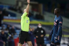 OFF: Referee Anthony Taylor dismisses Arsenal's Nicolas Pepe in November's goalless draw between Leeds United and the Gunners at Elland Road. Photo by Molly Darlington - Pool/Getty Images.