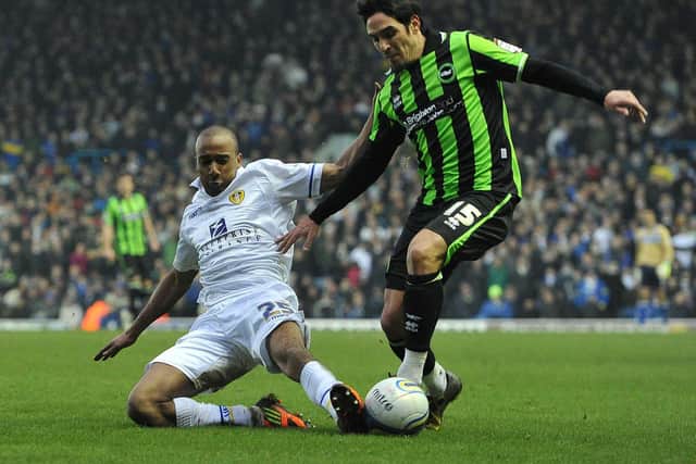 BACK AGAIN: Fabian Delph, left, challenges Brighton's Vicente as a Leeds United loanee from Aston Villa upon his Whites return in February 2012 in the 2-1 Championship defeat at Elland Road. Picture by PA Wire.