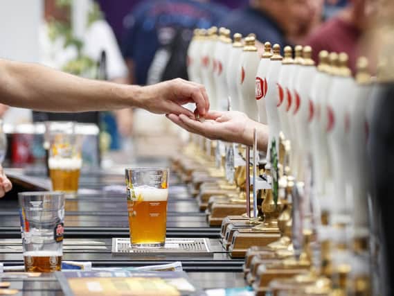 CAMRA is celebrating the best of the brewing industry over 50 years. Photo credit: TOLGA AKMEN/AFP via Getty Images.