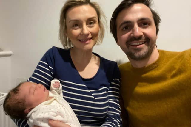 Joe Guest, 35, with girlfriend Charlotte Symonds, 38, and baby Ophelia
