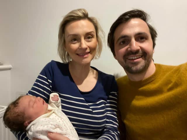 Joe Guest, 35, with girlfriend Charlotte Symonds, 38, and baby Ophelia
