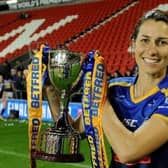 Rhinos captain Courtney Hill with the Women's Super League trophy. Picture by Steve Riding.