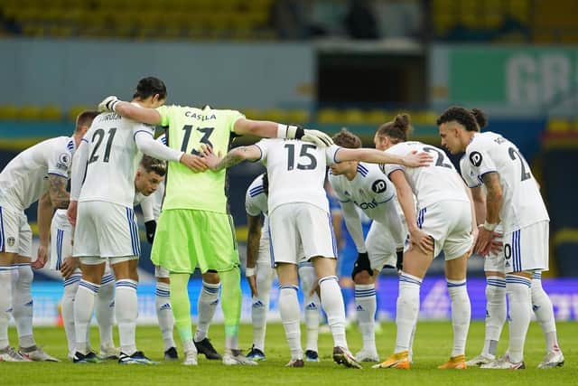 TEAM SPIRIT: Leeds United's players before last Saturday's Premier League clash at home to Brighton. Photo by JON SUPER/POOL/AFP via Getty Images.