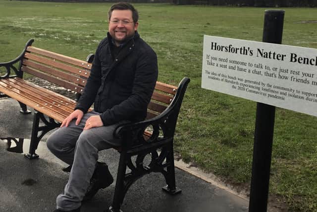 Councillor Jonathon Taylor on the natter bench in Hall Park, Horsforth.