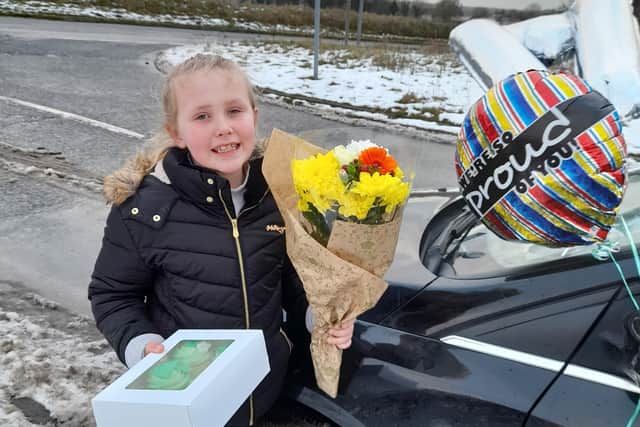 Eight-year-old Mollie Horner walked 20 miles in the snow for her granddad (photo: Macmillan)