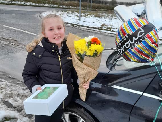 Eight-year-old Mollie Horner walked 20 miles in the snow for her granddad (photo: Macmillan)