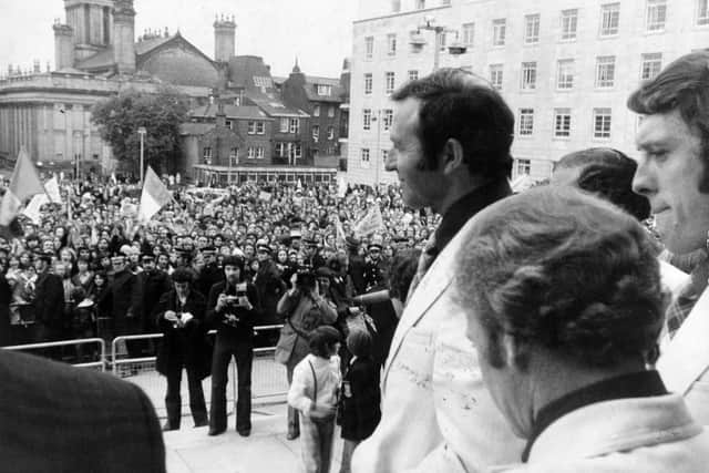 HEROES' RETURN: Former Whites manager Jimmy Armfield leads out the Leeds United team to greet supporters on the steps of the Civic Hall in Leeds following the 1975 European Cup final in Paris. Picture by YPN.