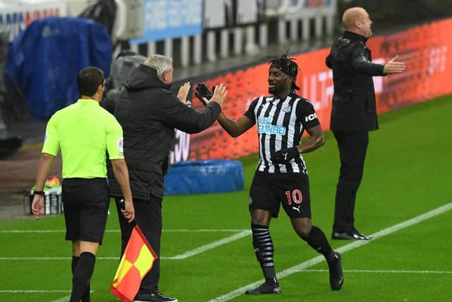 BACK IN THE SQUAD: Newcastle United's star man Allan Saint-Maximin, pictured celebrating with Magpies boss Steve Bruce after his strike in the 3-1 win at home to Burnley on October 3. Photo by Stu Forster/Getty Images.