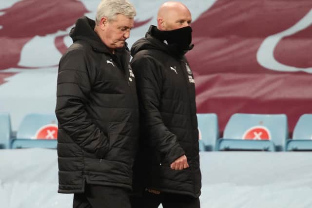 CONCERN: For Newcastle United boss Steve Bruce, left, pictured after Saturday night's 2-0 loss against Aston Villa at Villa Park with assistant Steve Agnew. Photo by Clive Brunskill/Getty Images.
