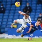 NO DWELLING: Leeds United winger Jack Harrison is challenged by Solly March during last weekend's 1-0 defeat at home to Brighton. Photo by Michael Regan/Getty Images.