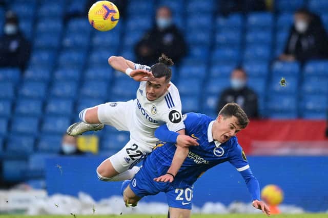 NO DWELLING: Leeds United winger Jack Harrison is challenged by Solly March during last weekend's 1-0 defeat at home to Brighton. Photo by Michael Regan/Getty Images.