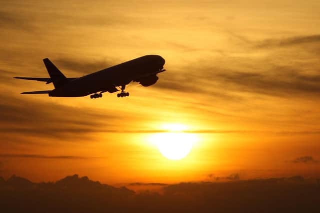 File photo dated 19/11/08 of a plane taking off at sunset. Airlines are being investigated by the competition watchdog over concerns they breached consumer rights by failing to offer cash refunds for flights passengers could not take amid the pandemic.