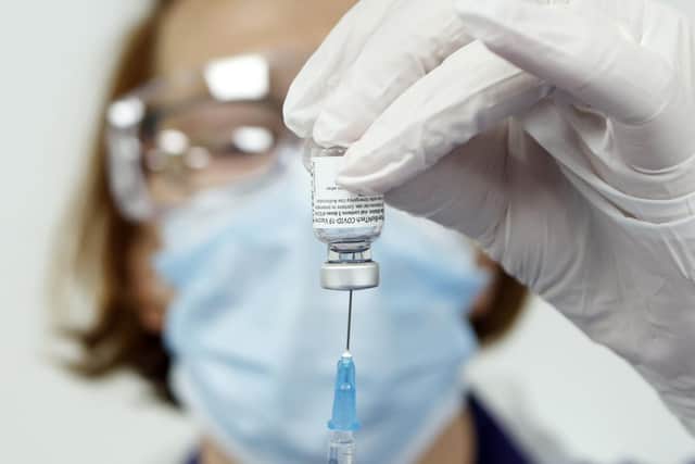 Nurse Pat Sugden prepares the Pfizer-BioNTech vaccine at the Thackray Museum of Medicine in Leeds. Pic: Danny Lawson/PA