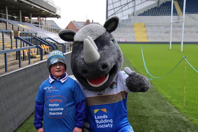 Isaac Lawley with Ronnie the Rhino
