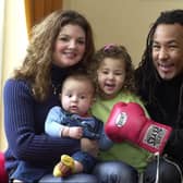 Retiring boxing Leeds champion Ashley Crawford with his wife Hayley and children Asia, three and 15-month-old Theo. PIC: Mel Hulme